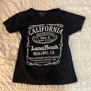 ON FIRE brand. Size small. Designed with rips. Like new